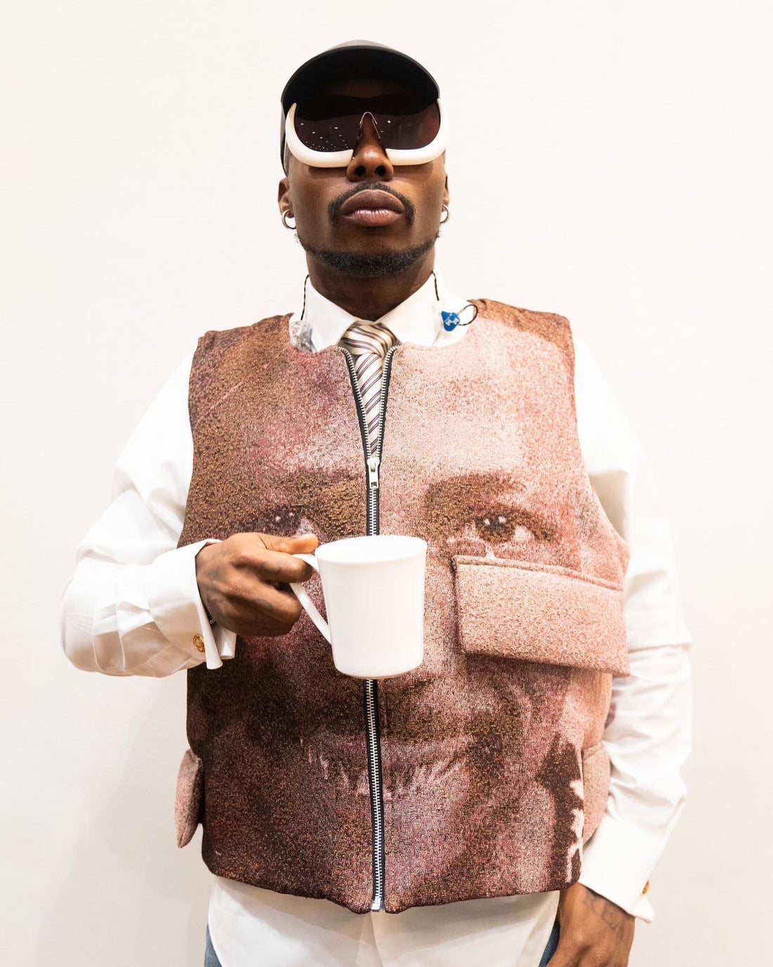 Asake wearing DOGANCI custom made vest